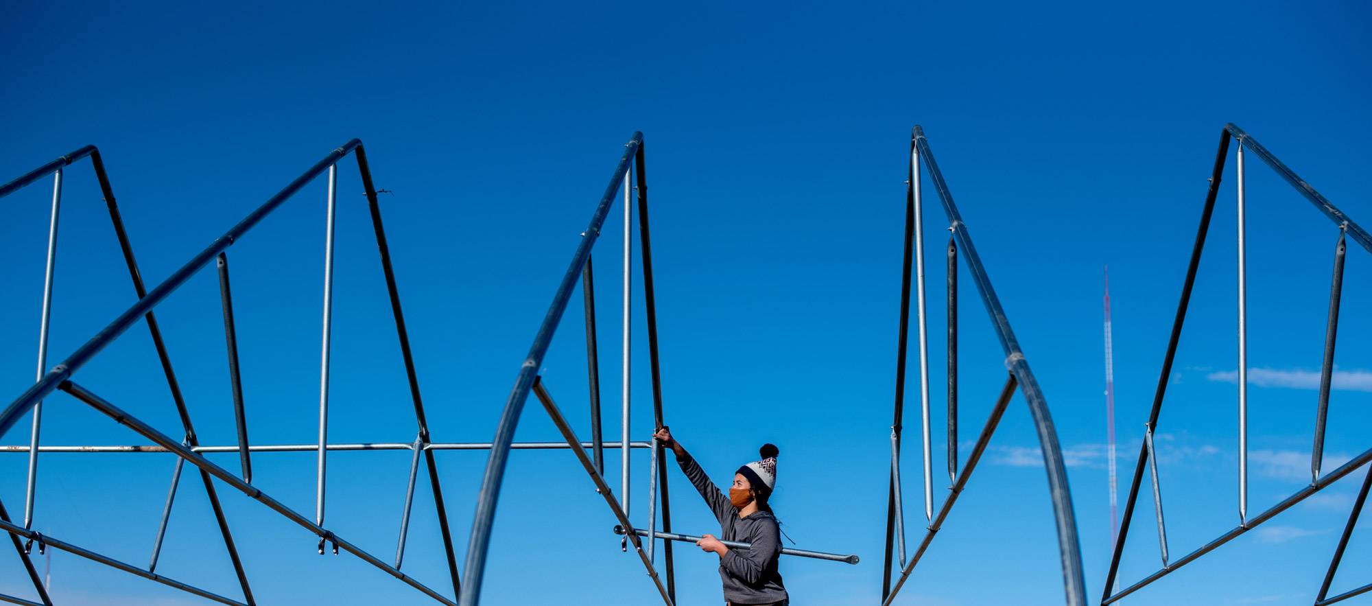 A gothic-style hoophouse was erected at the Sustainable Agriculture Project. Employees from Nifty Hoops, New City Neighbors and volunteers from the Grand Valley community were on hand to help with the project. Angela Haan, president of the GVSU Farm Club, came to work on the installation.